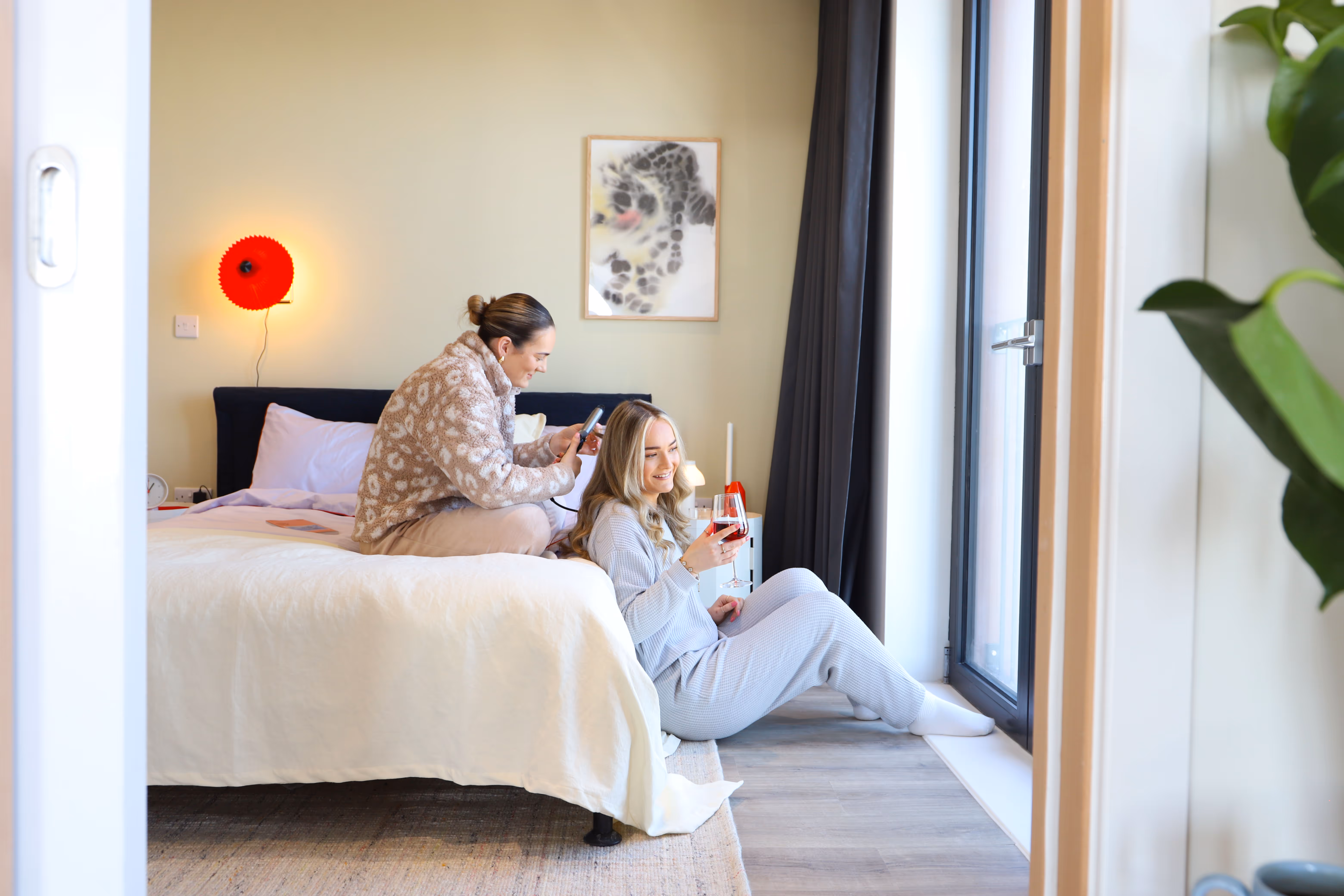 An Ollo building with young people featured.