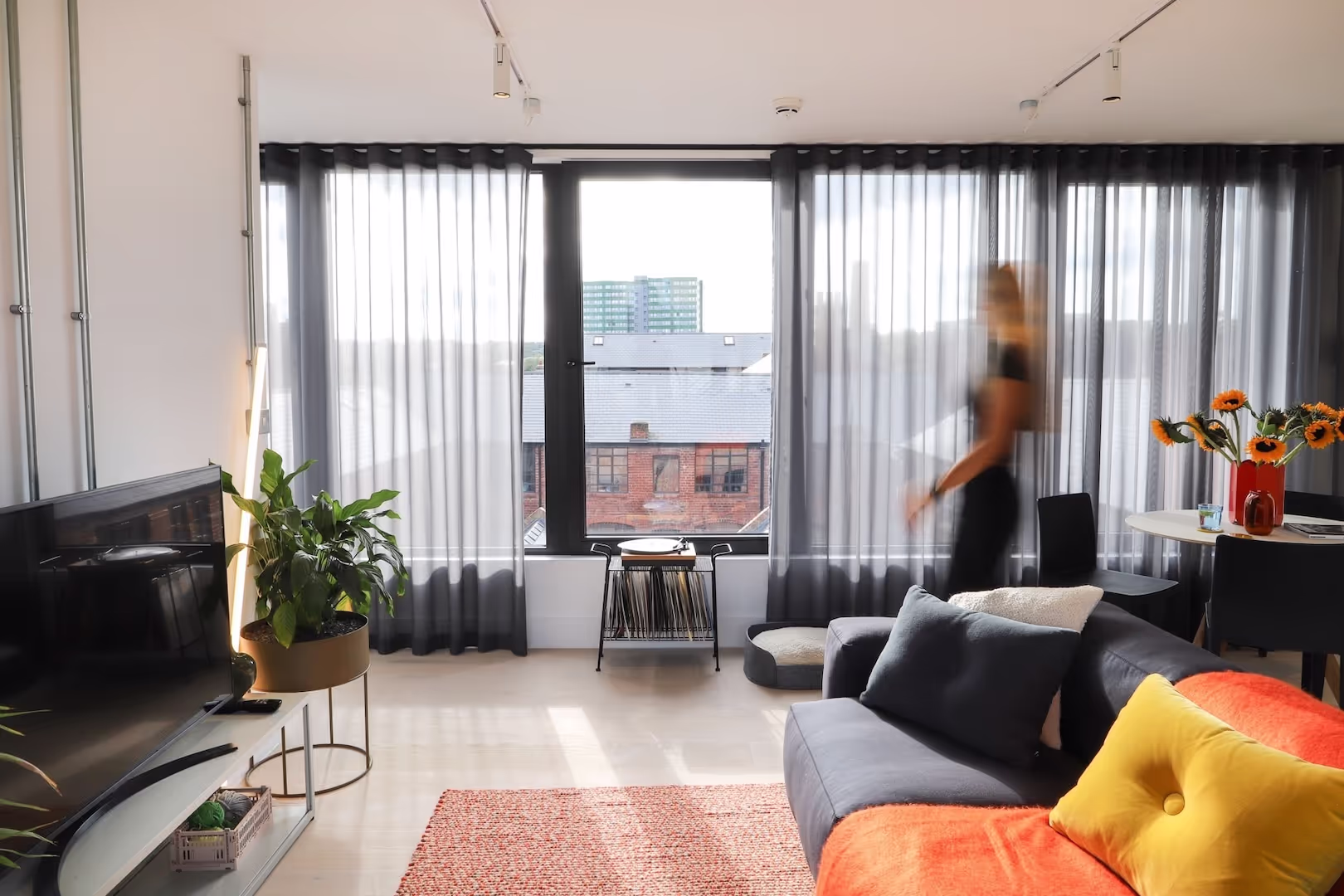 Ollo apartment with huge windows and HAY furniture