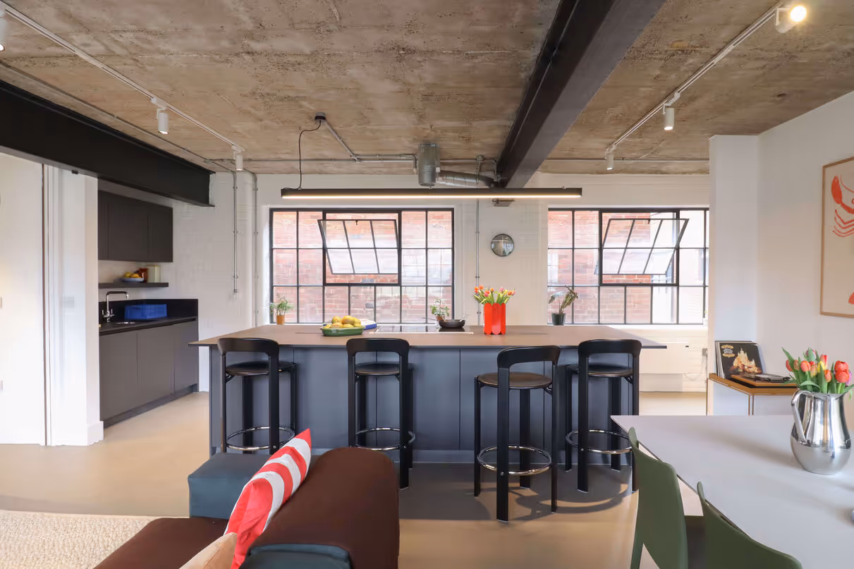 Open plan kitchen and living room at Eyewitness