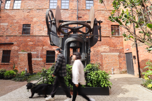 A woman in a courtyard
